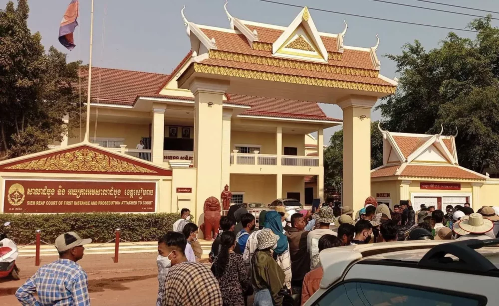 Victims of the Brilliant City World scam gather outside Siem Reap Provincial Court on April 11, 2024. (Supplied)