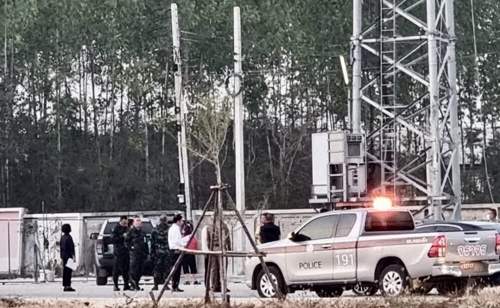 Thai police in Sa Kaeo province inspect telephone poles near the border with Poipet as part of a move to cut services to suspected scam centers. Feb. 11, 2025. (Supplied).