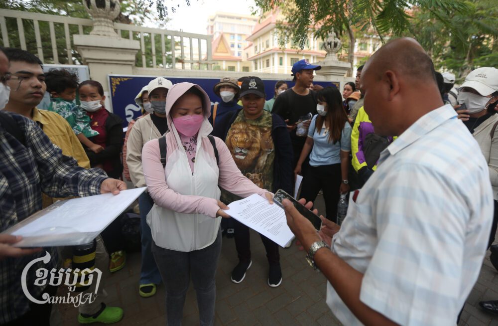 LRSU members gather at the Ministry of Labor and Vocational Training building to seek an update of their complaint about their dispute with NagaWorld from three years ago, February 21, 2025. (CamboJA/Pring Samrang)