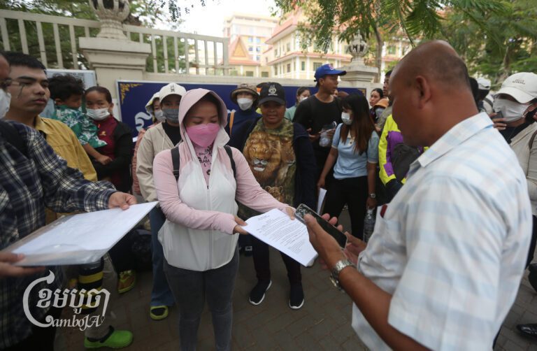 LRSU members gather at the Ministry of Labor and Vocational Training building to seek an update of their complaint about their dispute with NagaWorld from three years ago, February 21, 2025. (CamboJA/Pring Samrang)