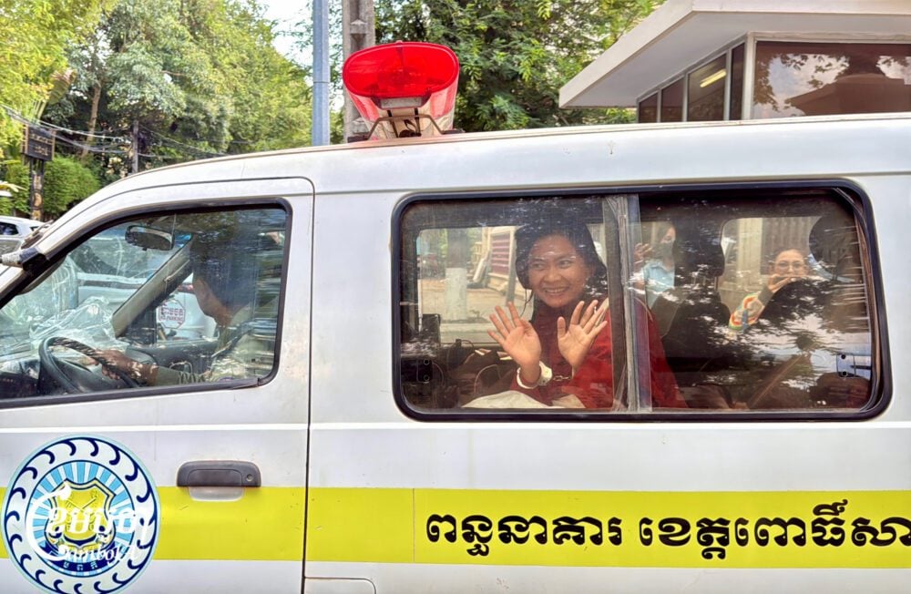 Phuon Keoreaksmey, an imprisoned member of the environmental group Mother Nature Cambodia, leaves the Supreme Court following a hearing on April 23, 2025. (CamboJA/Sovann Sreypich)