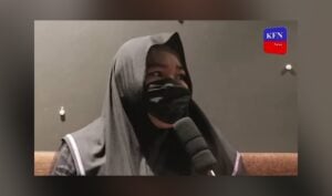 A screenshot photo of a survivor during an interview by KFN Hot News and posted on social media on April 5, 2025.