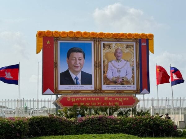 Portraits of Cambodian King Norodom Sihamoni and Chinese President Xi Jinping are displayed at Phnom Penh International Airport to welcome Xi for his two-day visit to Cambodia. Photo taken April 16, 2025. (Supplied)