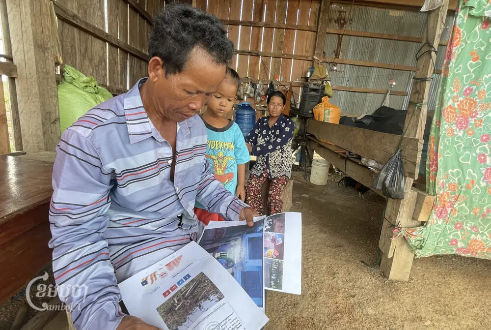 Uk Mao with his family members at his house in Thala Borivat district in Stung Treng province on May 19, 2024. (CamboJA/Men Chanthy)