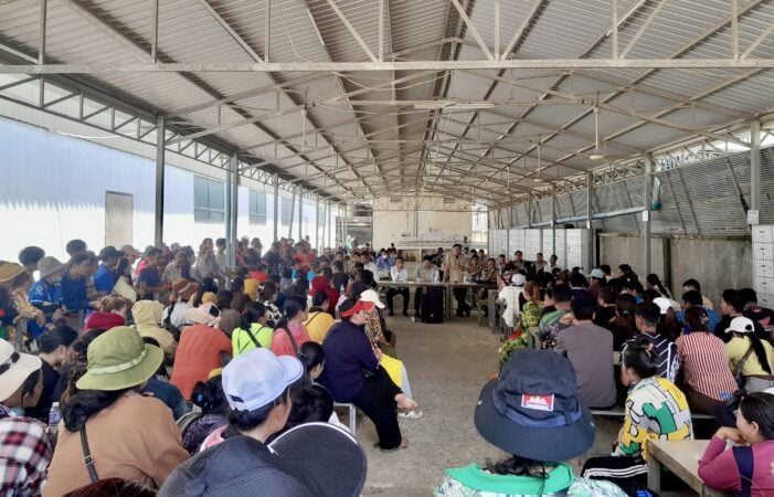 Workers of Color Star Cambodia Product Co Ltd meet with Labor and Vocational Training Ministry officials after their protest to demand a solution to the sudden factory relocation announcement, May 20, 2025. (Va Sopheanut)