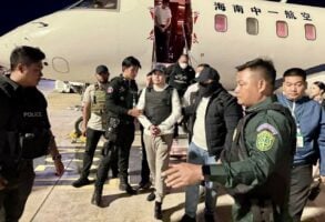 Former Oknha Heng Sithy arrives at Phnom Penh International airport on May 24, after being extradited from Russia. A photo posted on National Police’s Facebook.