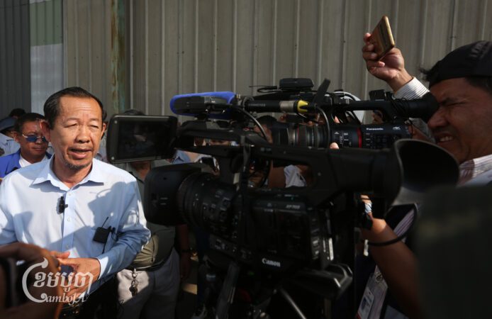 Rong Chhun talks to journalists after Phnom Penh Municipal Court gave its verdict on May 5, 2025. (CamboJA/Pring Samrang)