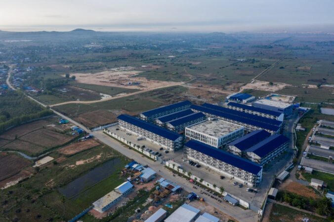 Drone footage captures high perimeter walls, security cameras and security guards surrounding a reported scamming compound observed by Amnesty International in Takeo province on May 20, 2025. (Photo: Amnesty International)