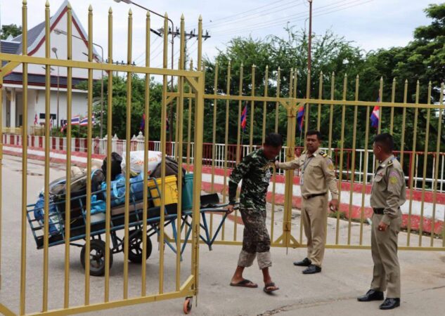 Cambodian police open a gate for man leaving via a Border Checkpoint on June 29, 2025. (Poipet Border checkpoint’s Facebook)