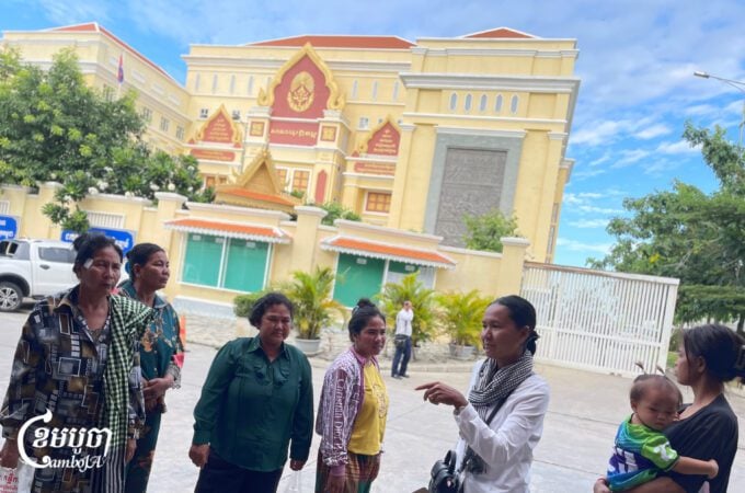 Samrong Tbong villagers from Boeung Tamok arrive at Phnom Penh municipality court to attend their hearing, June 26, 2025. (CamboJA/Pring Samrang)