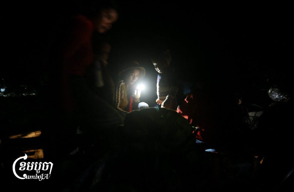 Villagers travel overnight to Siem Reap province after fleeing bombing during clashes along the Cambodia-Thailand border near the Prasat Ta Moan temple on July 24, 2025. (CamboJA/Pring Samrang)