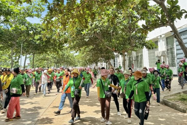 Workers at the Le Crown factory in Kampong Cham province leave for lunch. The Taiwanese-owned factory plans to lay off staff and roll back operations in December 2025, raising concerns over fair compensation and the challenge of finding new employment. (Supplied)