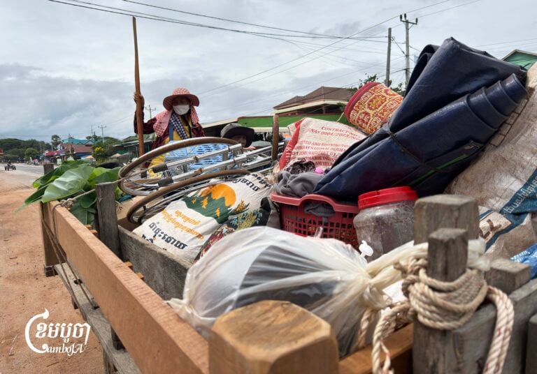 Seng Hat and his family on a tractor to Chheu Teal Kong village, which is close toThai border on October 30, 2025. (CamboJA/Va Sopheanut)