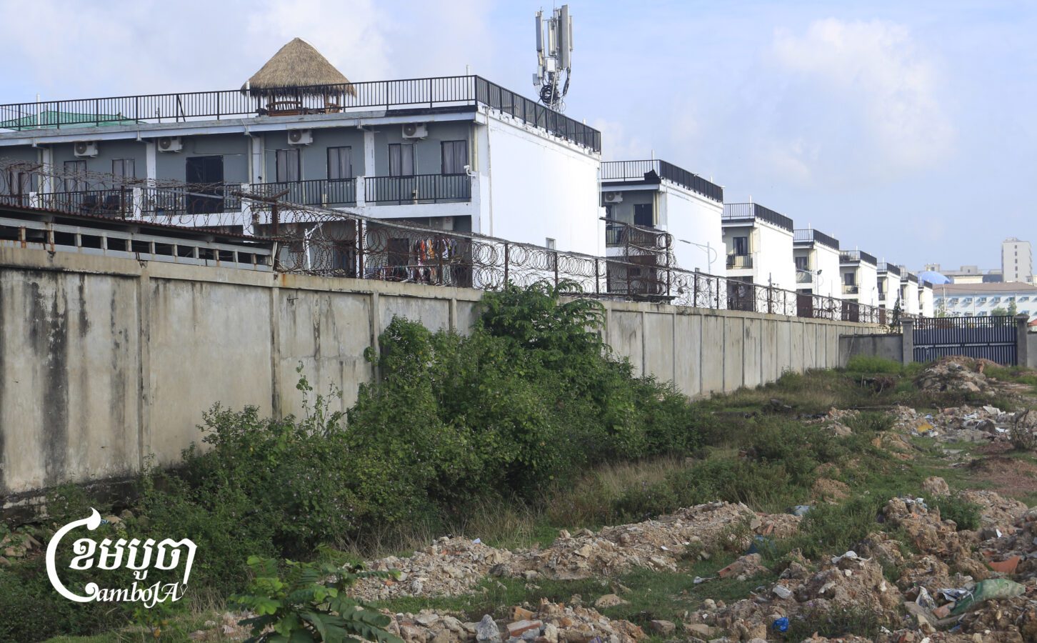 A sprawling, fortified compound in Bavet City linked to online scam operations, identified as Venus Park. (25 Oct., 2024) (CamboJA/Coby Hobbs)
