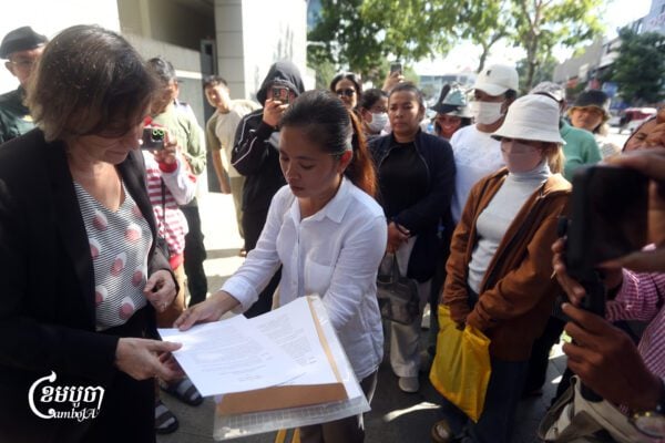 LRSU president Chhim Sithar and members submit a petition to the Australian Embassy in Phnom Penh, October 20, 2025. (CamboJA/Pring Samrang)