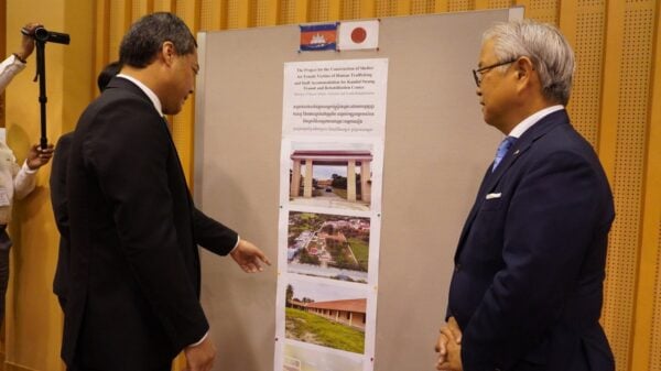 Ueno Atsushi, Japanese ambassador, and Chea Somethy, Minister of Social Affairs, visit the building project during the signing ceremony on December 16, 2025. (Photo: Japan Embassy)
