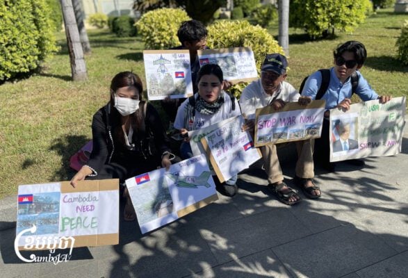 A group of Cambodian people gathered in front of the U.S embassy in Phnom Penh to submit a petition, requesting its help to stop the Thai military from using F-16 jets to bomb Cambodian territories, particularly civilian houses. However, the embassy rejected their petition because they submitted as individuals and not under an institution or organization. The embassy instead asked them to submit the petition to the Ministry of Post and Telecommunications. (CamboJA/Pring Samrang)